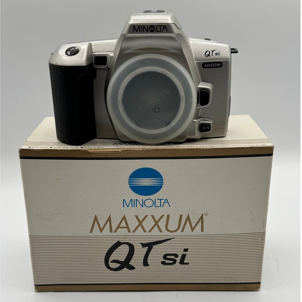New in box Minolta Maxxum QTsi 35mm SLR Film Camera Body Silver with Manual